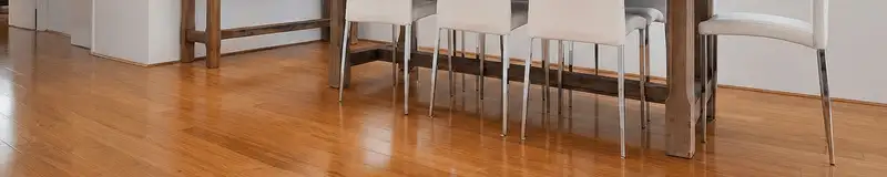 Professionally installed and refinished bamboo flooring in a residential home, showcasing smooth finish and natural wood tones in Wilmington, NC