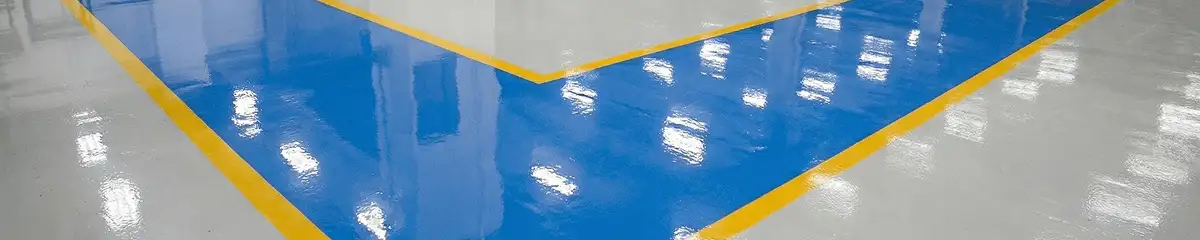A factory floor professionally covered and marked with epoxy flooring in Wilmington, NC