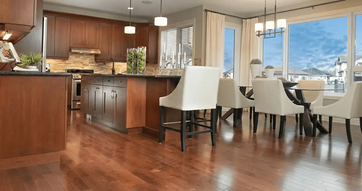 A modern kitchen with professionally installed wood flooring in Wilmington, NC
