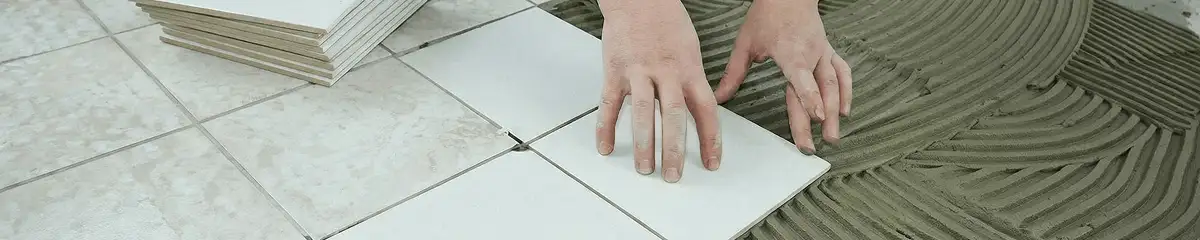 Professional installing white tile floors in Wilmington, NC