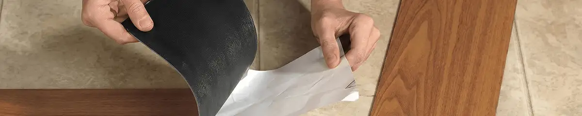 A professional installing vinyl flooring in Wilmington, NC